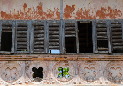 Windows of an old old french colonial building, Sud-Comoé, Grand-Bassam, Ivory Coast