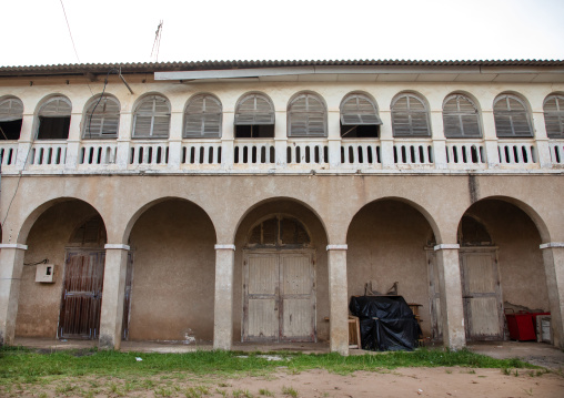 Old french colonial building which arcades in the UNESCO world heritage area, Sud-Comoé, Grand-Bassam, Ivory Coast