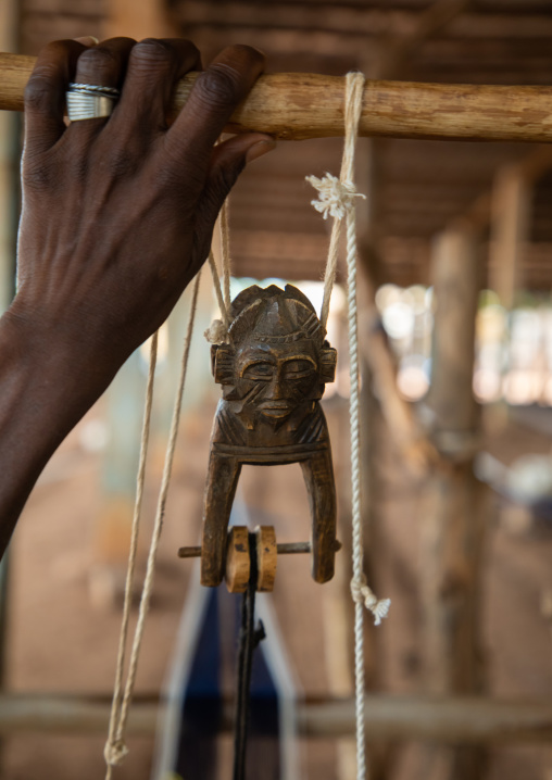 Figural heddle pulley in a traditional Senufo weaving factory, Savanes district, Waraniene, Ivory Coast