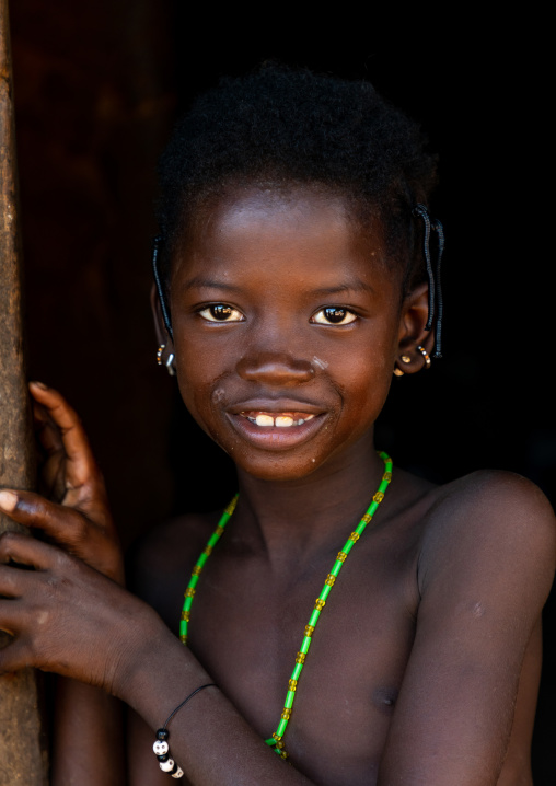 Portrait of a smiling Senufo girl, Savanes district, Niofoin, Ivory Coast