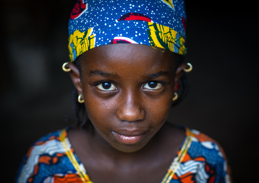 Portrait of a Peul tribe girl with colorful clothes, Savanes district, Boundiali, Ivory Coast