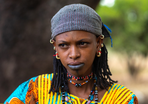 Portrait of a Peul tribe woman with tattooed lips, Savanes district, Boundiali, Ivory Coast