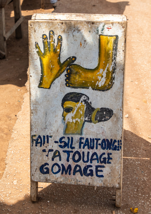 Beauty shop billboard in the street, Bafing, Gboni, Ivory Coast