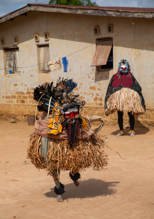 We Guere sacred masks dance during a ceremony, Guémon, Bangolo, Ivory Coast