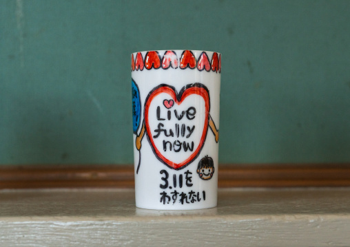 Mug with a hope message made by a child from a highly contaminated area after the daiichi nuclear power plant irradiation, Fukushima prefecture, Naraha, Japan