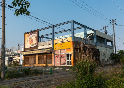 Abandoned shop in the difficult-to-return zone after the daiichi nuclear power plant irradiation, Fukushima prefecture, Tomioka, Japan