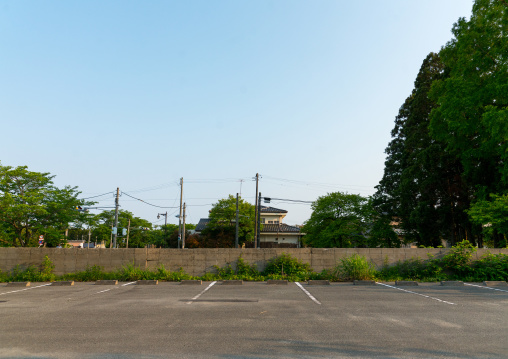 Empty parking in the difficult-to-return zone after the daiichi nuclear power plant irradiation, Fukushima prefecture, Tomioka, Japan