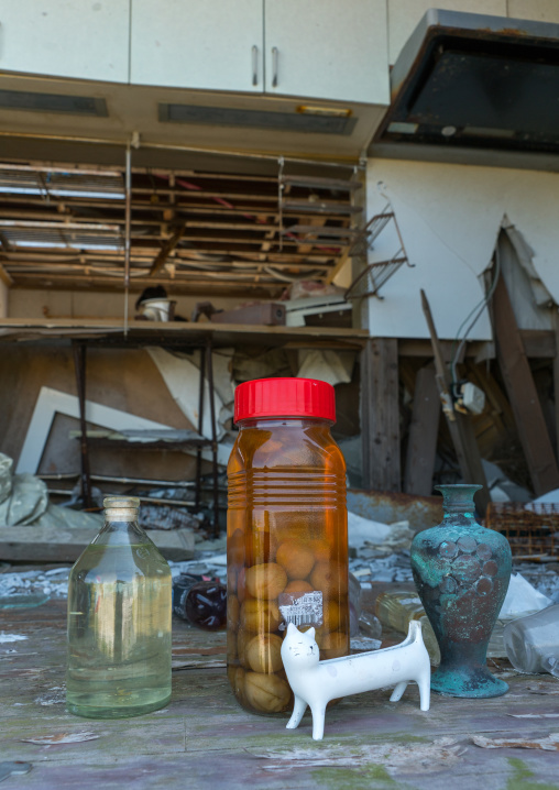 Offerings inside a house destroyed by the 2011 earthquake and tsunami five years after, Fukushima prefecture, Namie, Japan
