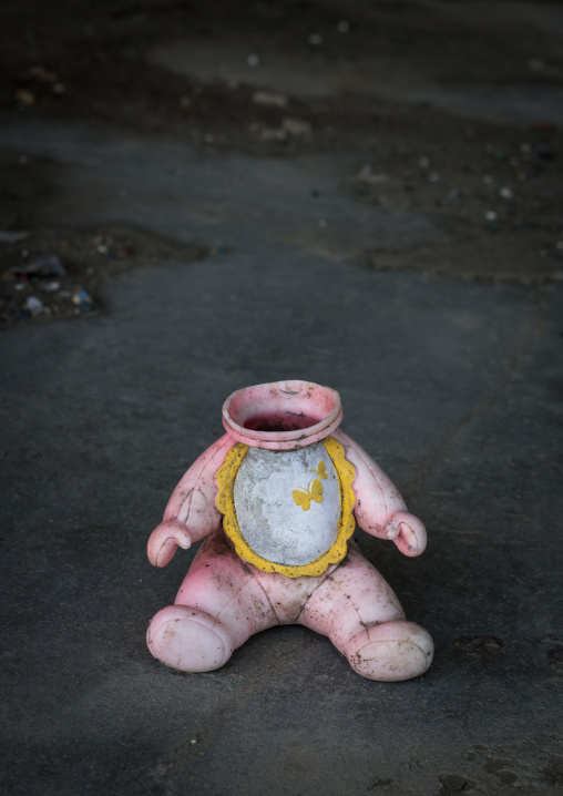 A doll without head inside a house destroyed by the 2011 earthquake and tsunami five years after, Fukushima prefecture, Namie, Japan