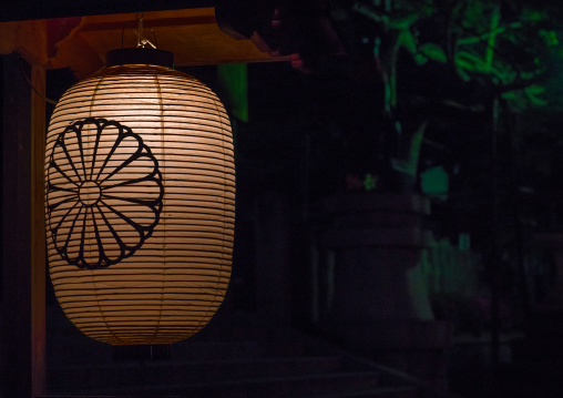 A traditional japanese lantern at fushimi inari shrine, Kansai region, Kyoto, Japan