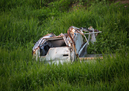 A destroyed and abandoned car by 2011 tsunami, Fukushima prefecture, Tomioka, Japan