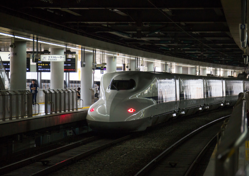 Shinkansen bullet train entering the station, Kansai region, Kyoto, Japan