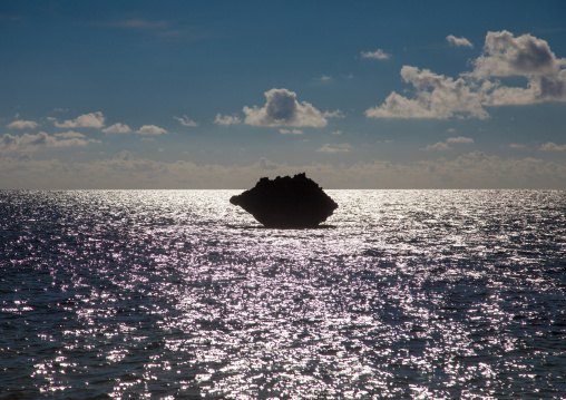Huge rock in front of sunset beach, Yaeyama Islands, Ishigaki, Japan