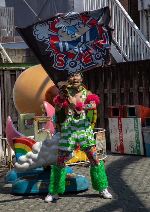 Hanayashiki park japanese pirat actor waving a flag, Kanto region, Tokyo, Japan