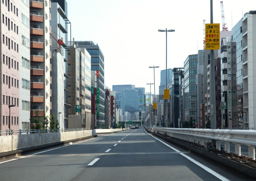 Empty street with modern buildings, Kanto region, Tokyo, Japan