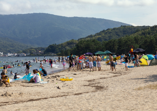 Crowdy beach along the sandbar in Amanohashidate, Kyoto Prefecture, Miyazu, Japan