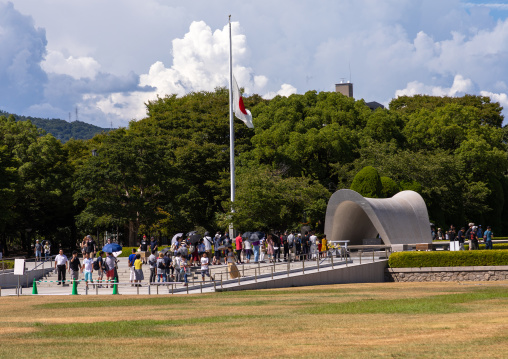 People visiting the cenotaph for a-bomb victims and a-bomb dome, Chugoku region, Hiroshima, Japan