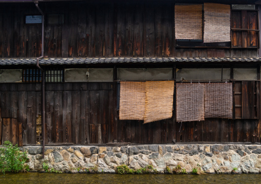 Japanese wooden house bamboo curtains, Kansai region, Kyoto, Japan