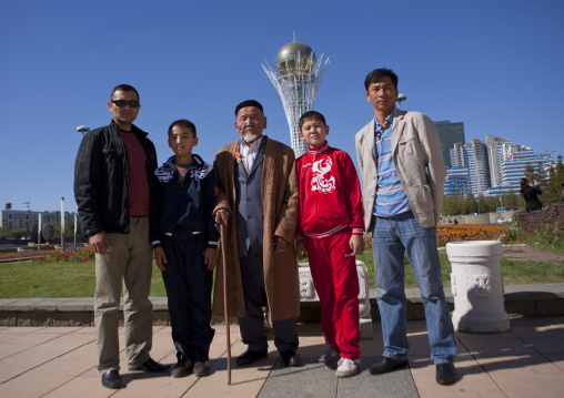 Old Veteran And His Family In Front Of Baiterek Tower, Astana, Kazakhstan