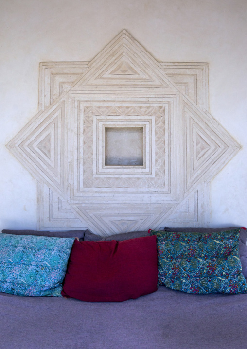Carved plasterwork used to put some antique artefacts as decoration in forodhani house, Lamu county, Shela, Kenya