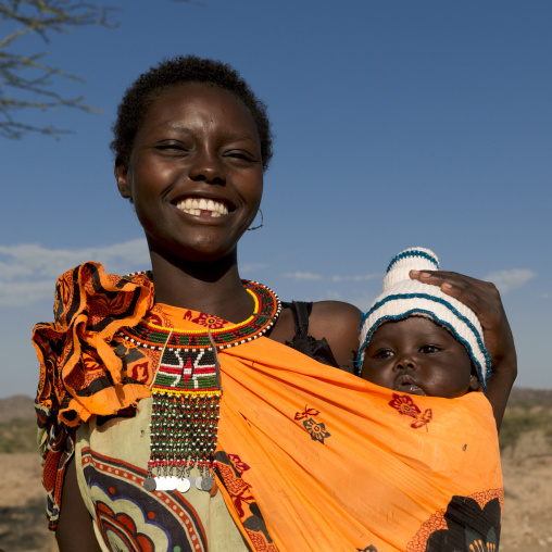 Smiling Samburu tribe woman with her child, Samburu County, Maralal, Kenya