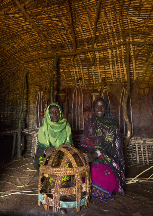 Borana tribe women inside a hut, Chalbi desert, Marsabit, Kenya