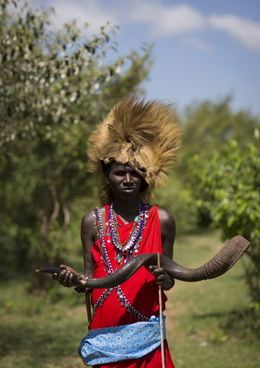 Maasai warrior with a lion hat fur on the head, Nakuru county, Nakuru, Kenya