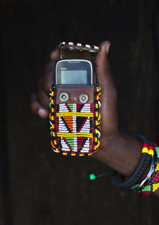 Masai warrior mobile phone decorated with beads, Nakuru county, Nakuru, Kenya