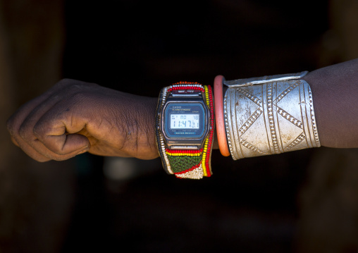 Rendille tribe warrior showing his watch decorated with beads, Marsabit district, Ngurunit, Kenya