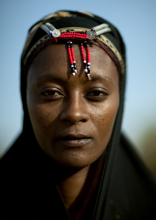 Portrait of a Gabra tribe woman wearing the traditional headwear, Marsabit County, Chalbi Desert, Kenya