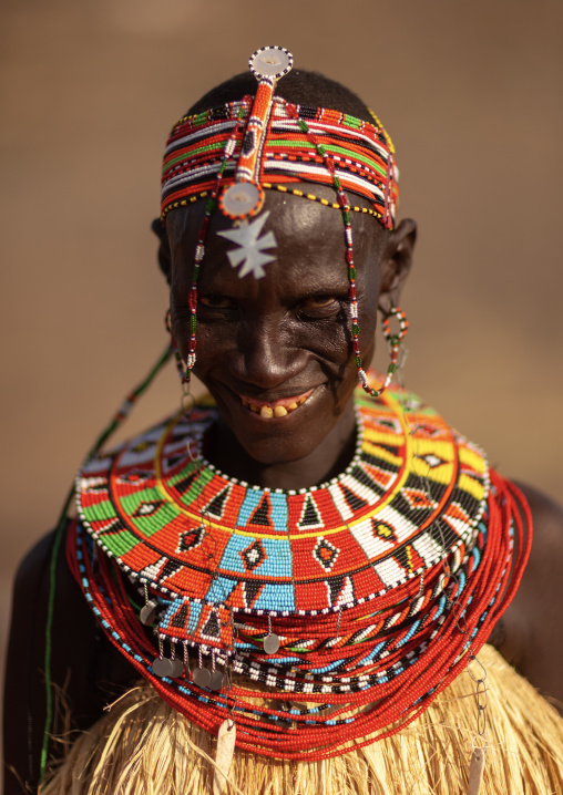 Portrait of a smiling El Molo tribe woman, Rift Valley Province, Turkana lake, Kenya