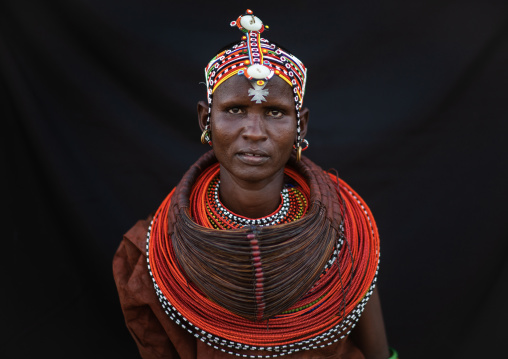 Portrait of a Rendille tribe woman with necklaces and headwear, Rift Valley Province, Turkana lake, Kenya