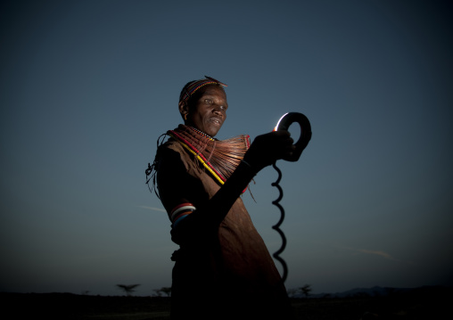 Portrait of a Rendille tribe woman looking at a flash, Rift Valley Province, Turkana lake, Kenya