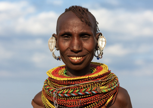 Smiling Turkana tribe woman with necklaces and earrings, Rift Valley Province, Turkana lake, Kenya