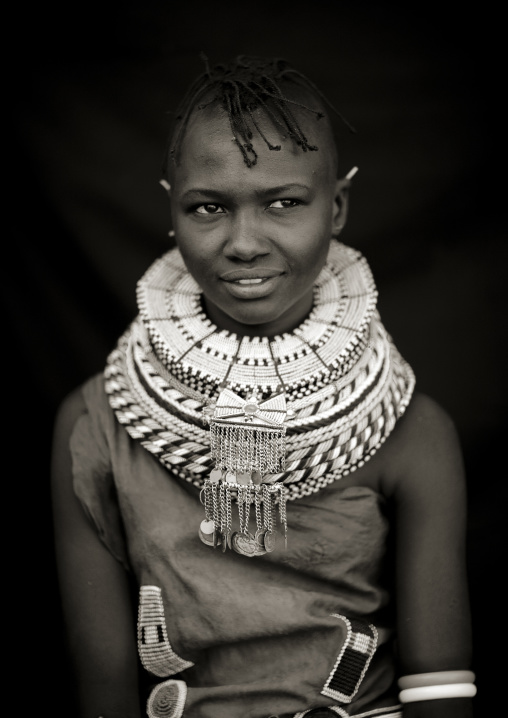 Turkana tribe woman with huge necklaces and earrings, Turkana lake, Loiyangalani, Kenya