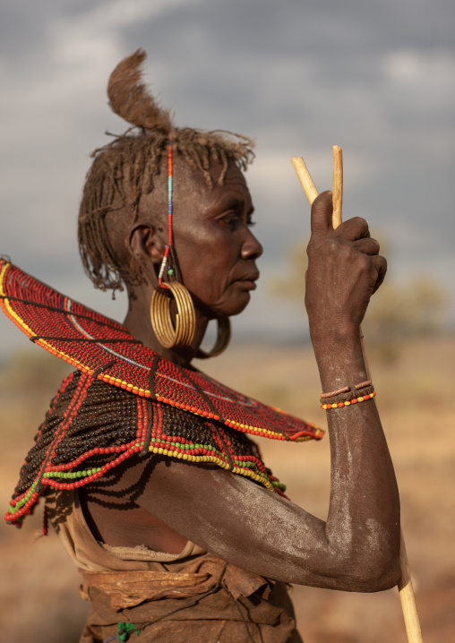 A pokot woman with a large necklace made from the stems of sedge grass, Baringo County, Baringo, Kenya