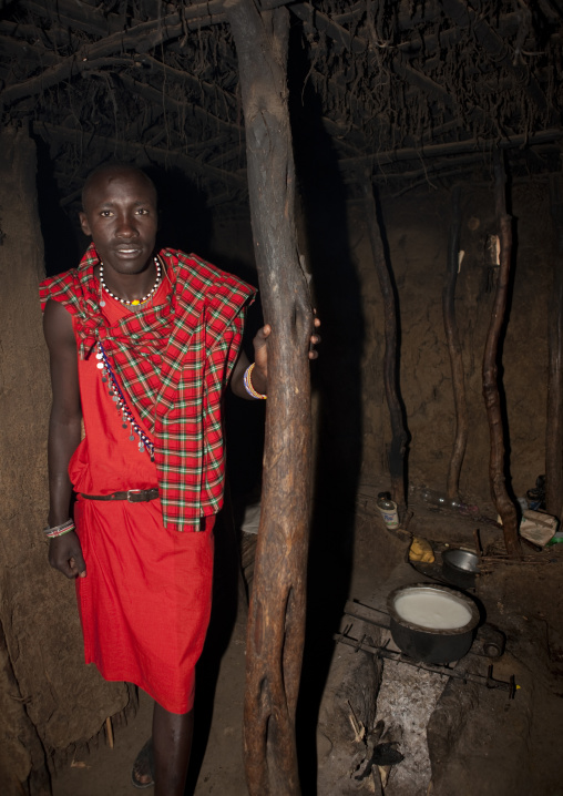 Maasai man inside his house, Rift Valley Province, Maasai Mara, Kenya