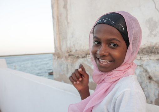 Smiling muslim girl in the street, Lamu County, Lamu, Kenya