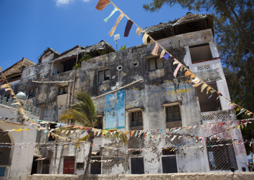 Old house with banners during Maulid festival, Lamu County, Lamu, Kenya