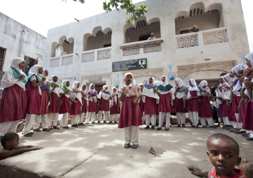 Young muslim girls singing during Maulid festival, Lamu County, Lamu, Kenya