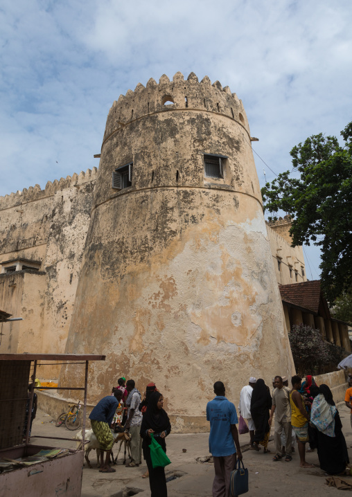 People passing in front of the fort, Lamu county, Lamu town, Kenya