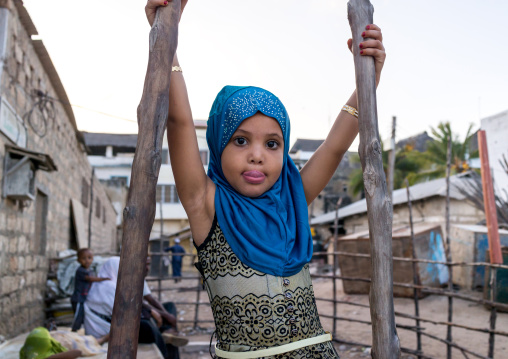 Young girl dressed with a blue veil, Lamu county, Lamu town, Kenya