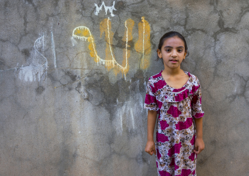 Young Syrian Refugee Girl In Front Of A Allah Graffiti, Koya, Kurdistan, Iraq