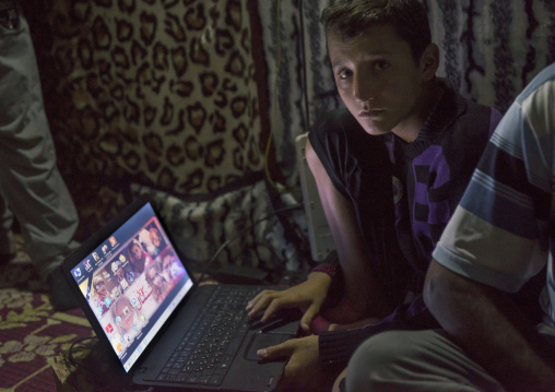 Yezedi Refugee From Sinjar Using A Computer, Duhok, Kurdistan, Iraq