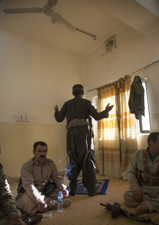 Kurdish Peshmerga Praying Before Going To The Frontline, Kirkuk, Kurdistan, Iraq