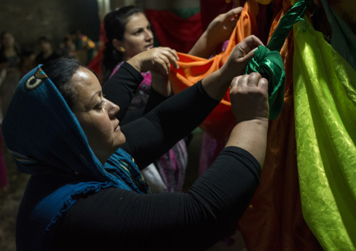 Yazidi Women Making Knots Inside The Temple City Of Lalesh, Kurdistan, Iraq