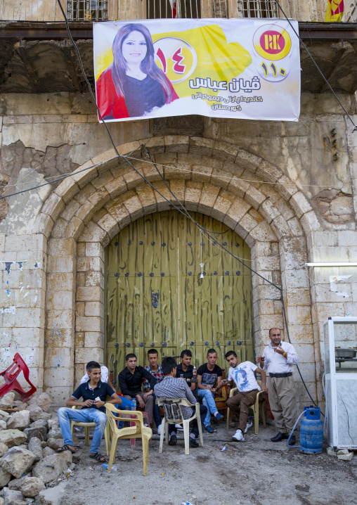 Kurdish Men Having Tea In The Street, Akre, Kurdistan, Iraq