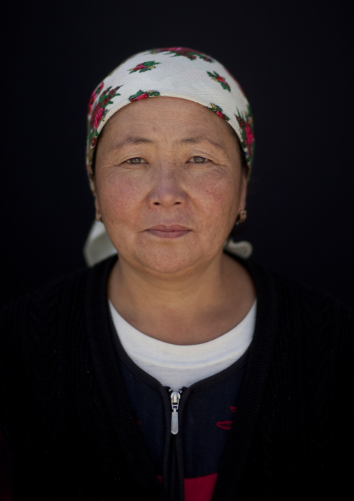 Woman Wearing A Headscarf In The Village Of Kyzart, Kyrgyzstan