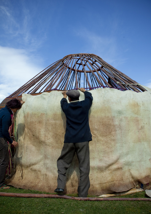Couple Putting Up A Yurt, Saralasaz Jailoo, Kyrgyzstan