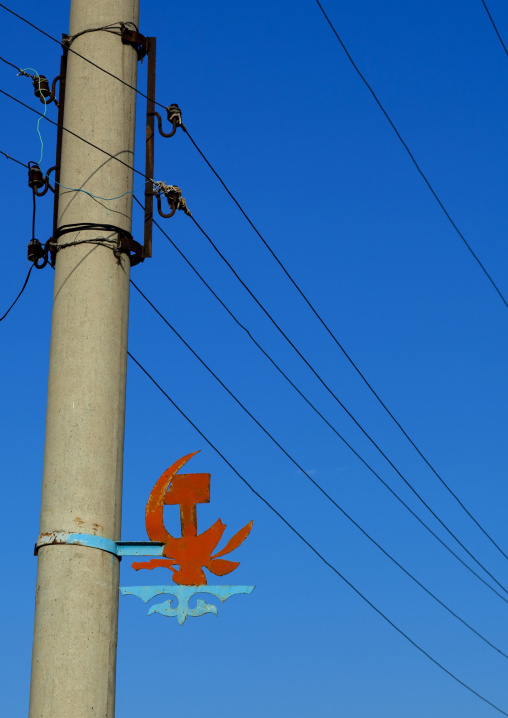 Hammer And Sickle Sign On An Electric Pylon, Kochkor, Kyrgyzstan